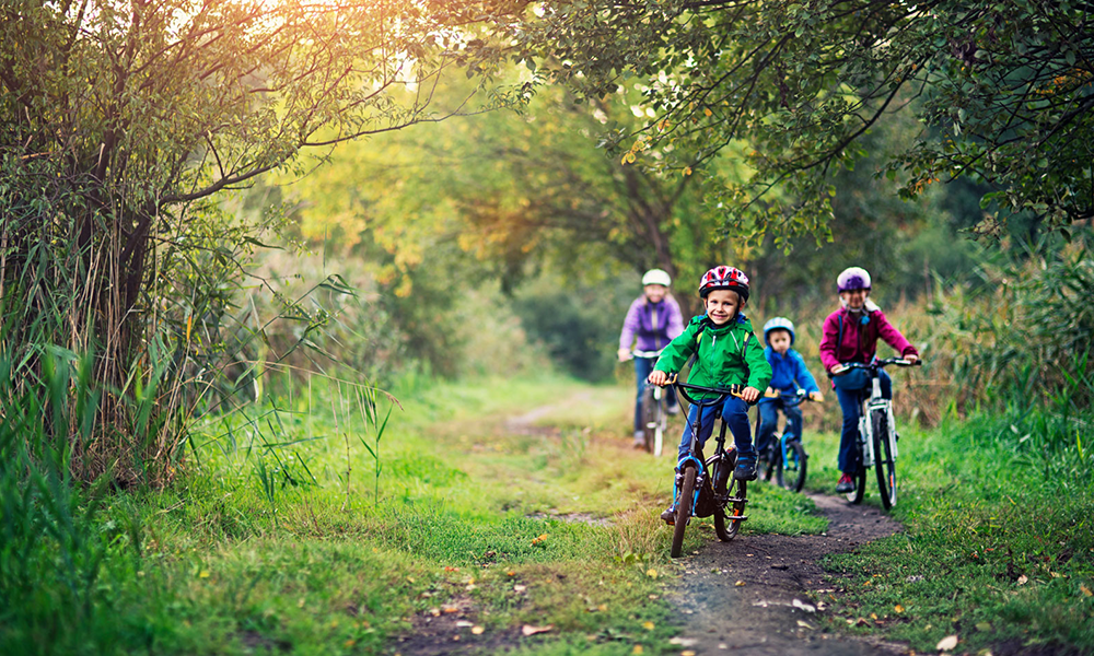 Photo of family enjoying a bike ride