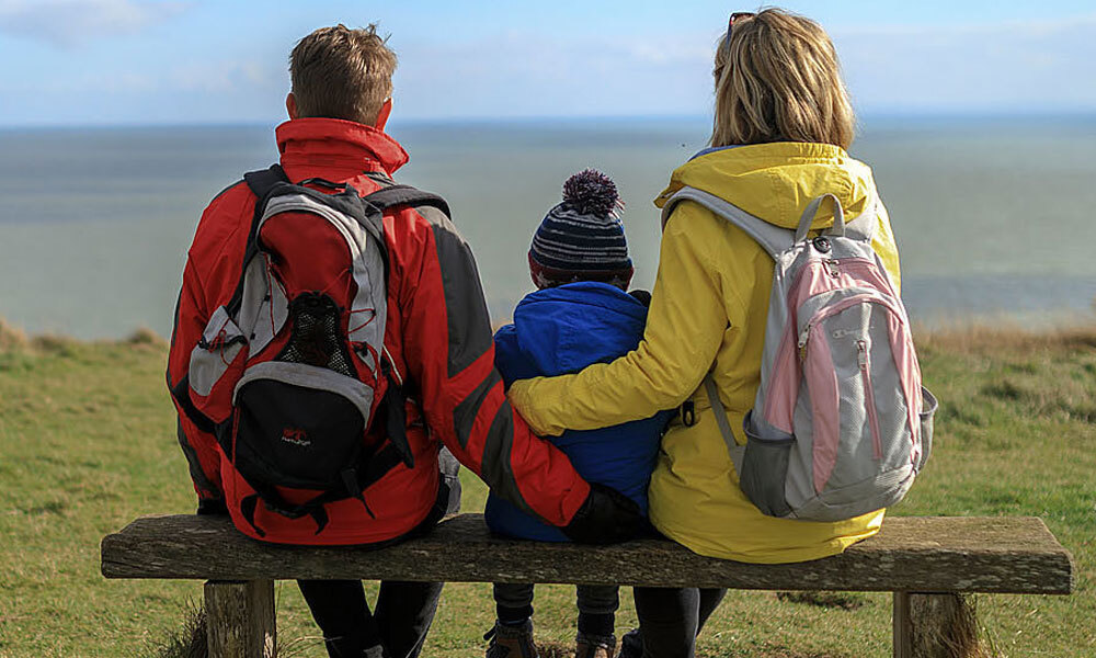 Photo of a family enjoying a day out walking