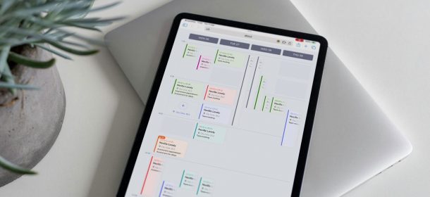 Tablet On Desk Showing Calendar And Appointment Booking Aspect Ratio 610 280