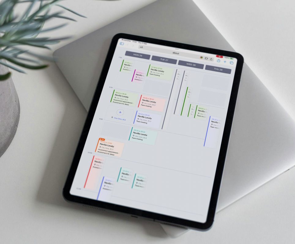 Tablet On Desk Showing Calendar And Appointment Booking Aspect Ratio 964 800